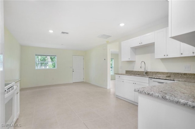1861 Lillie St, Fort Myers, FL 33916 - kitchen with white cabinetry, light stone countertops, dishwasher, visible vents, and recessed lighting