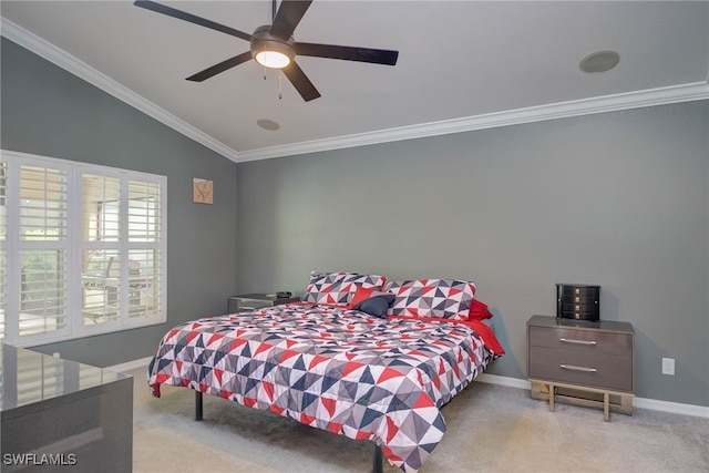 bedroom with carpet floors, ornamental molding, lofted ceiling, baseboards, and ceiling fan
