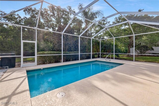 6044 Andros Way, Naples, FL 34119 - pool with glass enclosure, a grill, and a patio