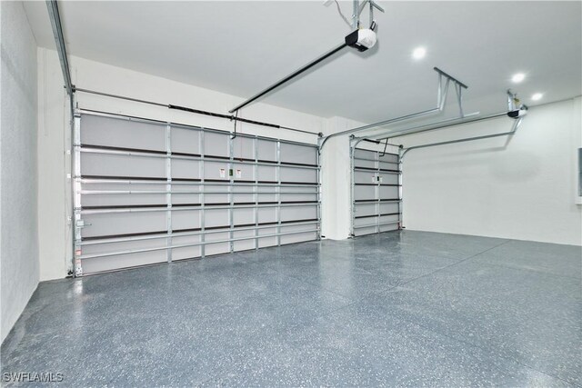 garage featuring a garage door opener