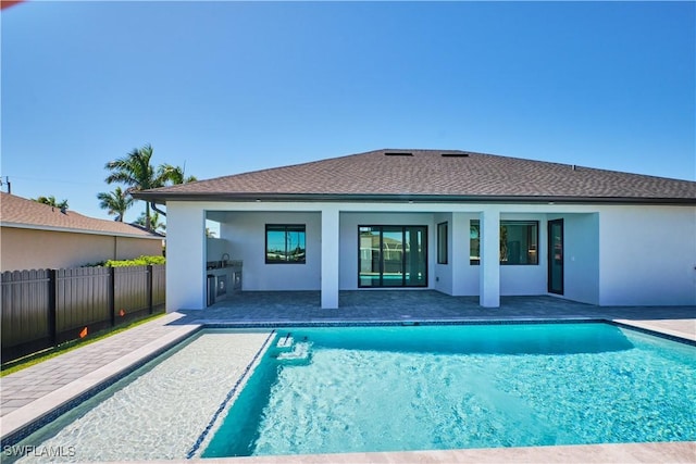 view of pool with a fenced in pool, a patio area, and fence