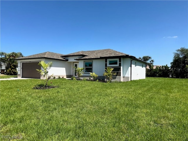 2321 SW 21st Ter, Cape Coral, FL 33991 - view of front of house with stucco siding, a garage, a front lawn, and driveway
