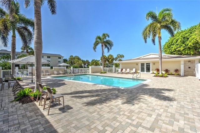 677 12th Ave S Unit 677, Naples, FL 34102 - community pool featuring fence and a patio area