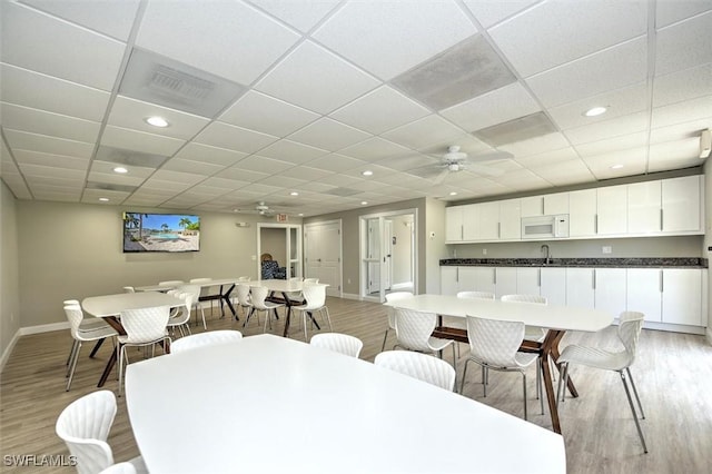 677 12th Ave S Unit 677, Naples, FL 34102 - dining space featuring ceiling fan, baseboards, visible vents, and light wood-type flooring