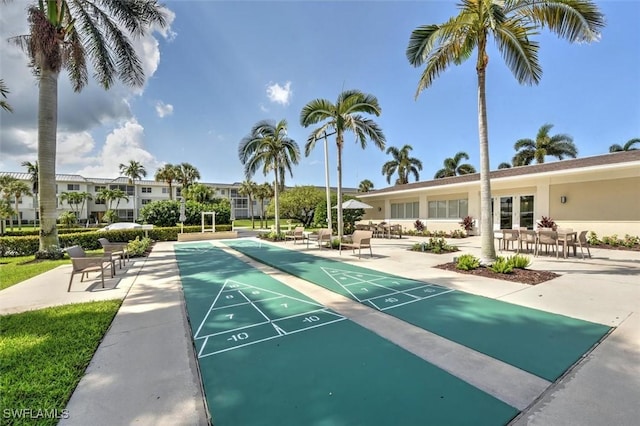 677 12th Ave S Unit 677, Naples, FL 34102 - view of home's community featuring shuffleboard