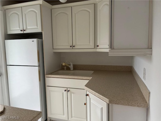 677 12th Ave S Unit 677, Naples, FL 34102 - kitchen featuring freestanding refrigerator and a sink