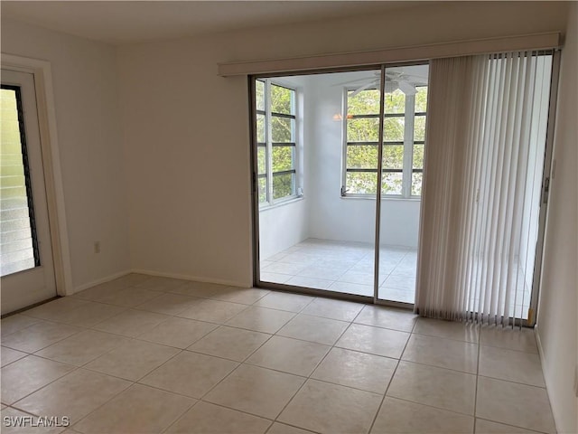 677 12th Ave S Unit 677, Naples, FL 34102 - empty room featuring light tile patterned flooring