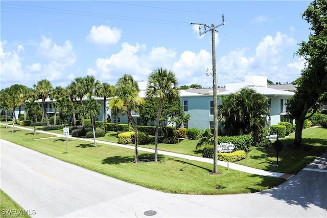 677 12th Ave S Unit 677, Naples, FL 34102 - view of property's community featuring a lawn