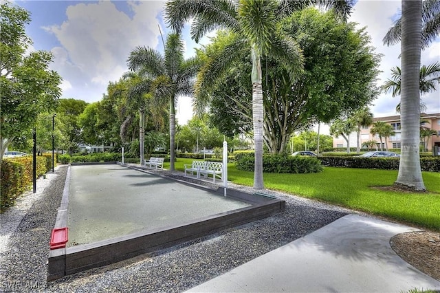 677 12th Ave S Unit 677, Naples, FL 34102 - view of community featuring a yard