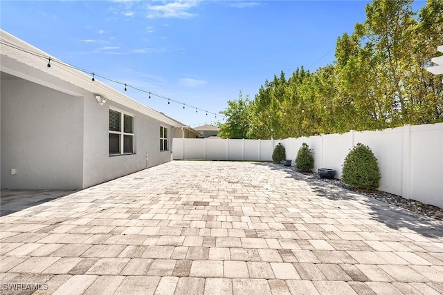 view of patio with a fenced backyard