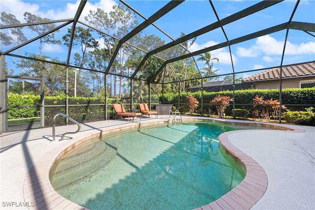 14864 Indigo Lakes Cir, Naples, FL 34119 - outdoor pool featuring a patio and a lanai