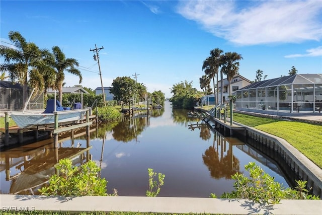 2324 Westwood Rd, North Fort Myers, FL 33917 - water view with a boat dock, a residential view, and boat lift