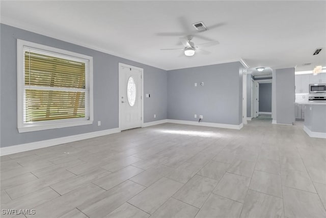 2324 Westwood Rd, North Fort Myers, FL 33917 - unfurnished living room with crown molding, visible vents, ceiling fan, and baseboards