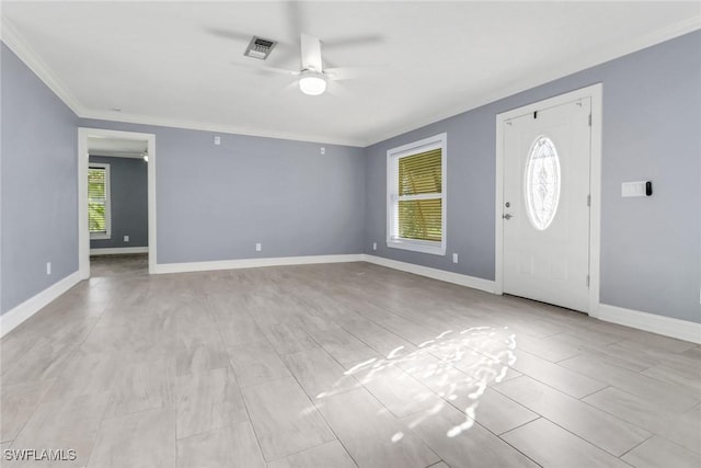 2324 Westwood Rd, North Fort Myers, FL 33917 - foyer entrance with visible vents, baseboards, a ceiling fan, and crown molding