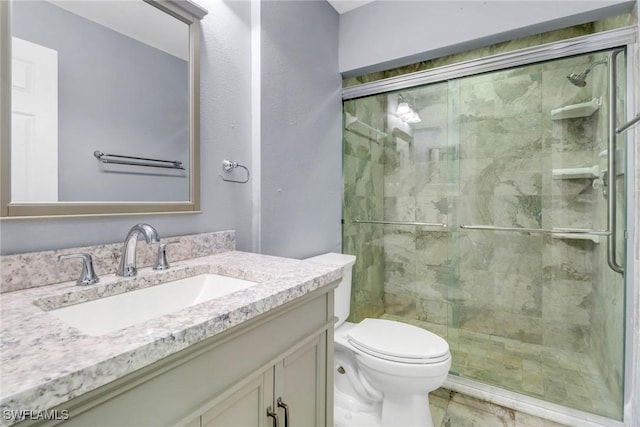 2324 Westwood Rd, North Fort Myers, FL 33917 - full bath featuring toilet, vanity, and a shower stall