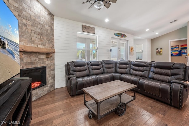 living room featuring ceiling fan, recessed lighting, vaulted ceiling, visible vents, and hardwood / wood-style flooring