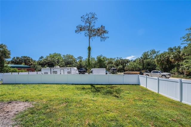 view of yard with fence