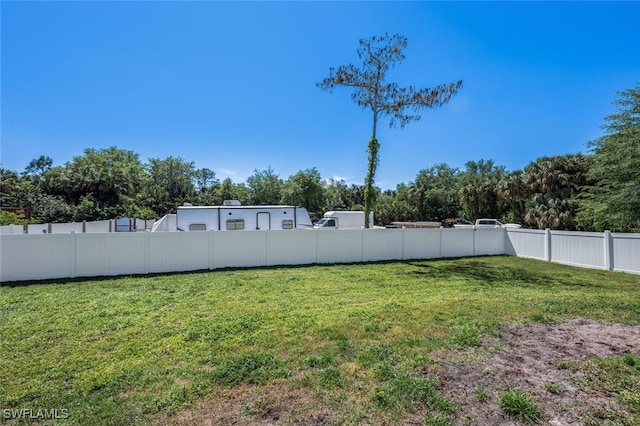 view of yard featuring a fenced backyard