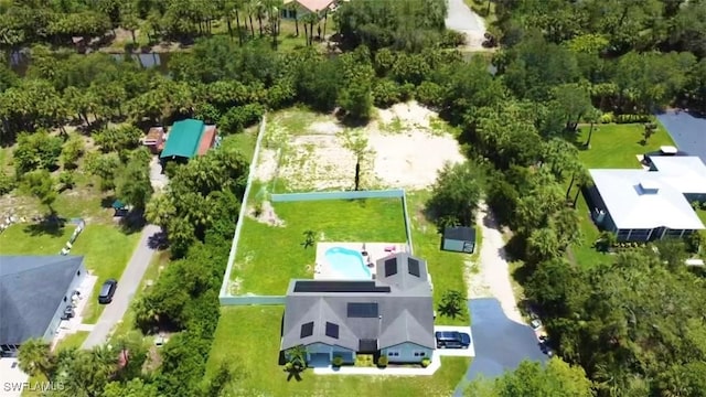 482 10th Ave NW, Naples, FL 34120 - aerial view of property's location with property parcel outlined and a pool