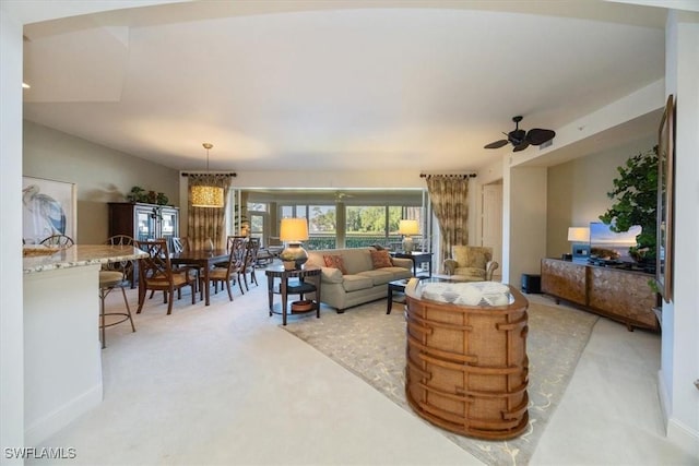 730 Waterford Dr Unit 102, Naples, FL 34113 - living area featuring ceiling fan and light carpet