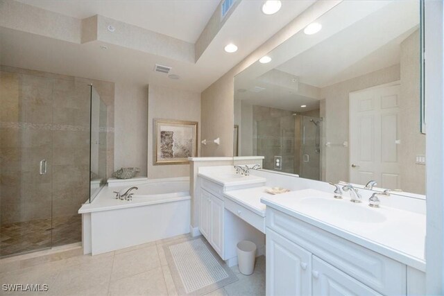 730 Waterford Dr Unit 102, Naples, FL 34113 - bathroom featuring tile patterned floors, a sink, two vanities, a shower stall, and a bath