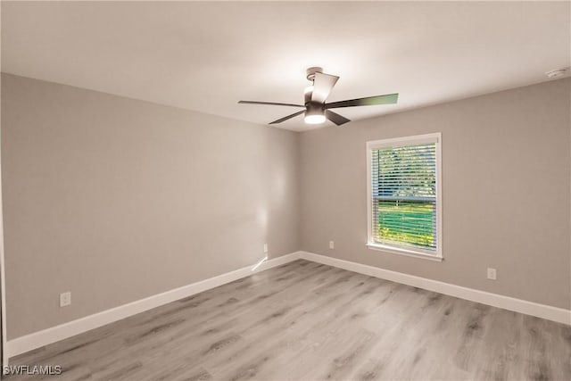 27260 Porto Nacional Dr, Punta Gorda, FL 33983 - unfurnished room featuring a ceiling fan, light wood-style flooring, baseboards, and a smoke detector