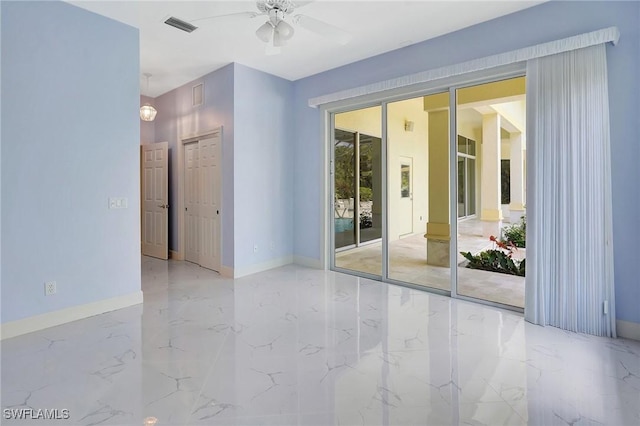 27231 Lakeway Ct, Bonita Springs, FL 34134 - unfurnished room with baseboards, marble finish floor, visible vents, and a ceiling fan