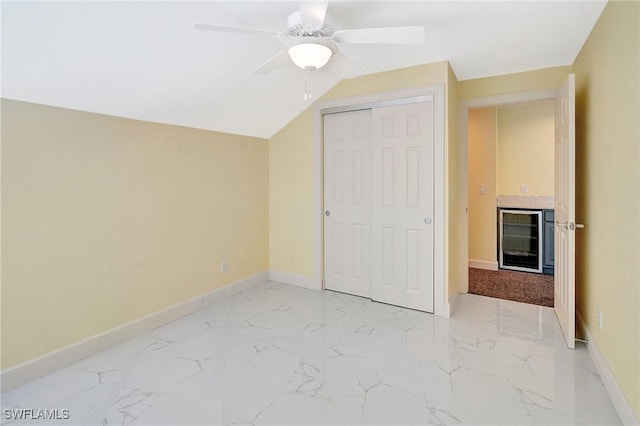 27231 Lakeway Ct, Bonita Springs, FL 34134 - bonus room featuring marble finish floor, baseboards, vaulted ceiling, and ceiling fan