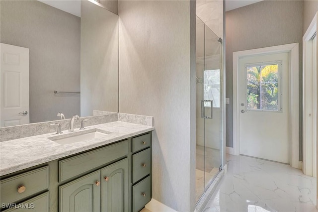 27231 Lakeway Ct, Bonita Springs, FL 34134 - bathroom with marble finish floor, vanity, and a stall shower