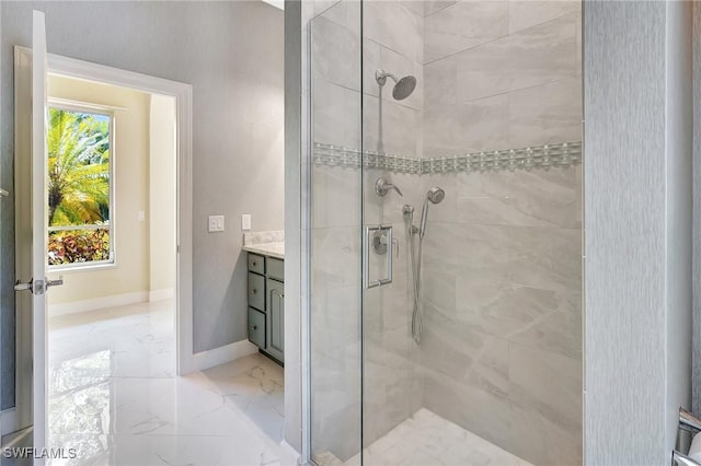 27231 Lakeway Ct, Bonita Springs, FL 34134 - full bath featuring marble finish floor, vanity, a stall shower, and baseboards