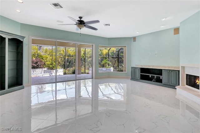 27231 Lakeway Ct, Bonita Springs, FL 34134 - unfurnished living room featuring marble finish floor, ceiling fan, visible vents, and recessed lighting