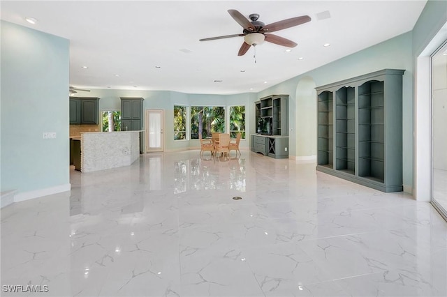 27231 Lakeway Ct, Bonita Springs, FL 34134 - unfurnished living room featuring baseboards, marble finish floor, recessed lighting, and a ceiling fan