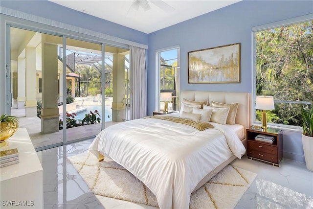 27231 Lakeway Ct, Bonita Springs, FL 34134 - bedroom featuring marble finish floor and access to exterior