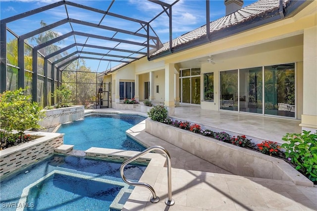 27231 Lakeway Ct, Bonita Springs, FL 34134 - view of swimming pool featuring a ceiling fan, a pool with connected hot tub, glass enclosure, and a patio area
