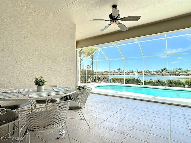 20716 Tisbury Ln, North Fort Myers, FL 33917 - pool with a patio area, ceiling fan, and glass enclosure