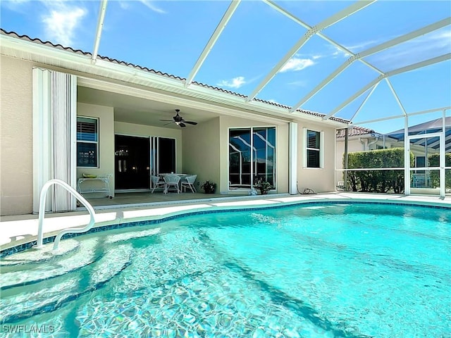 20716 Tisbury Ln, North Fort Myers, FL 33917 - outdoor pool with a lanai, a patio area, and ceiling fan