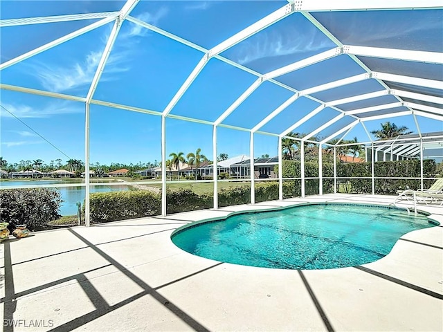 20716 Tisbury Ln, North Fort Myers, FL 33917 - pool with a water view, a patio, and glass enclosure