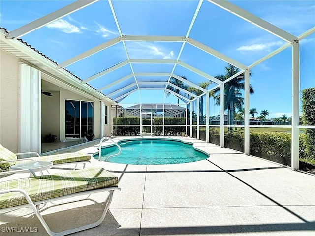 20716 Tisbury Ln, North Fort Myers, FL 33917 - view of swimming pool with a lanai, a patio, and a fenced in pool