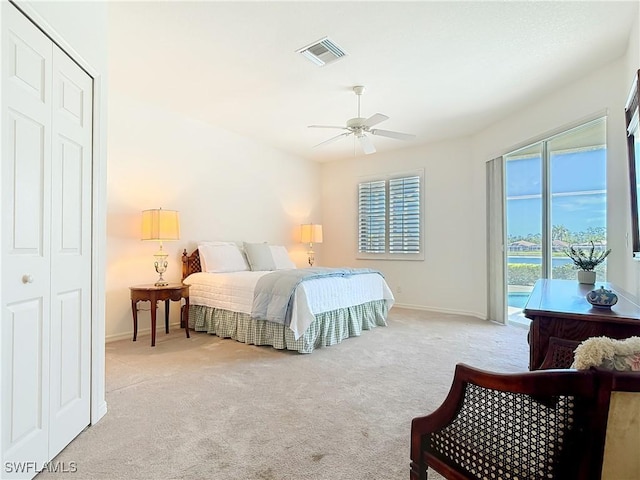 20716 Tisbury Ln, North Fort Myers, FL 33917 - bedroom with visible vents, baseboards, ceiling fan, access to exterior, and carpet flooring