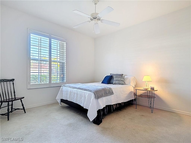 20716 Tisbury Ln, North Fort Myers, FL 33917 - bedroom with carpet, baseboards, and a ceiling fan