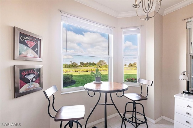 dining area with light tile patterned floors, baseboards, ornamental molding, and a chandelier