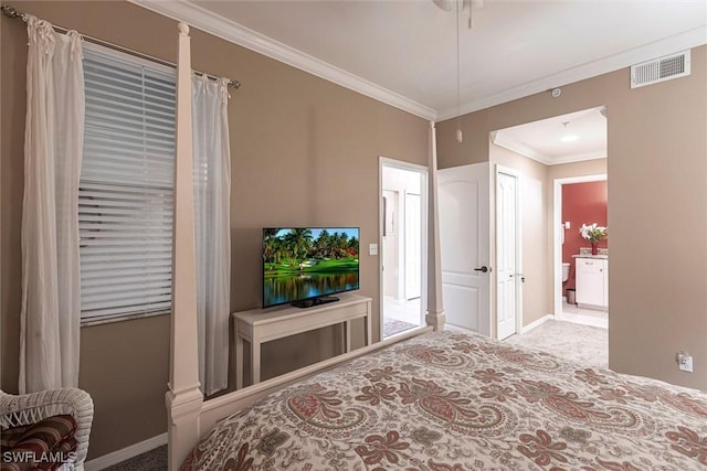 carpeted bedroom featuring visible vents, ornamental molding, and baseboards