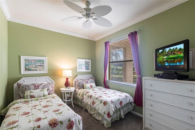 carpeted bedroom featuring crown molding, baseboards, and a ceiling fan