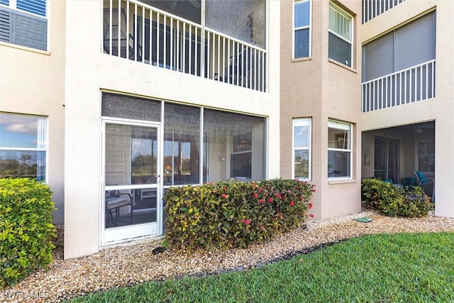 exterior space with stucco siding