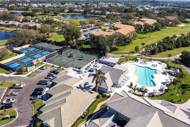 aerial view with a water view and a residential view