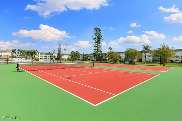 1004 Manatee Rd Unit H201, Naples, FL 34114 - view of tennis court featuring community basketball court