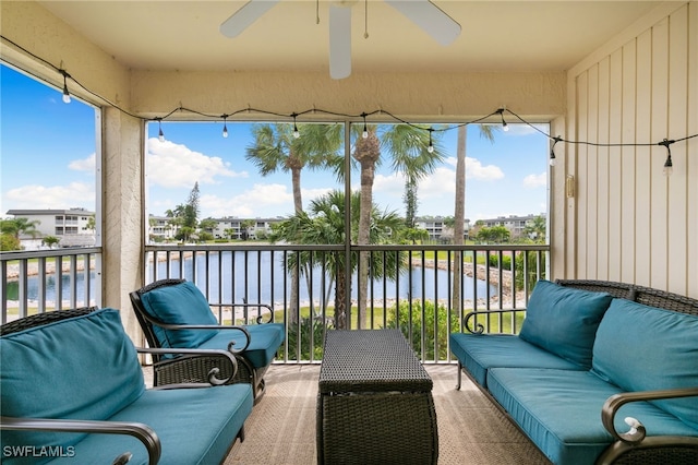 1004 Manatee Rd Unit H201, Naples, FL 34114 - sunroom featuring ceiling fan, a water view, and an outdoor living space