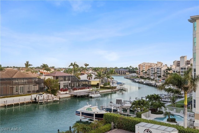 845 Collier Ct Unit 503, Marco Island, FL 34145 - water view with nearby suburban area and a dock