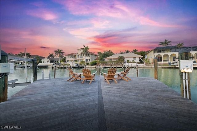 845 Collier Ct Unit 503, Marco Island, FL 34145 - dock with a water view, a residential view, and boat lift