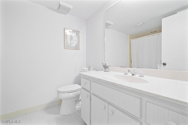 845 Collier Ct Unit 503, Marco Island, FL 34145 - full bath with tile patterned flooring, toilet, and vanity